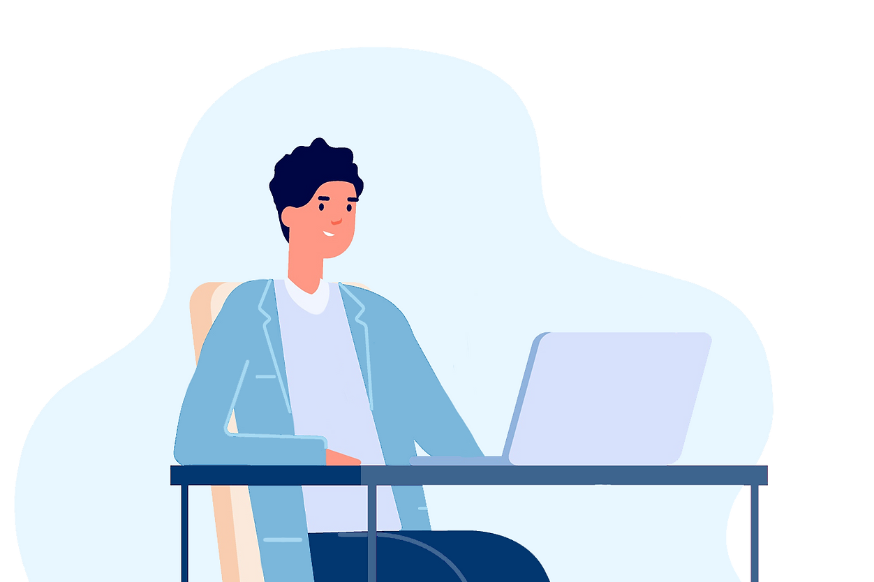 Eine Person sitzt an einem Tisch vor einem Laptop.